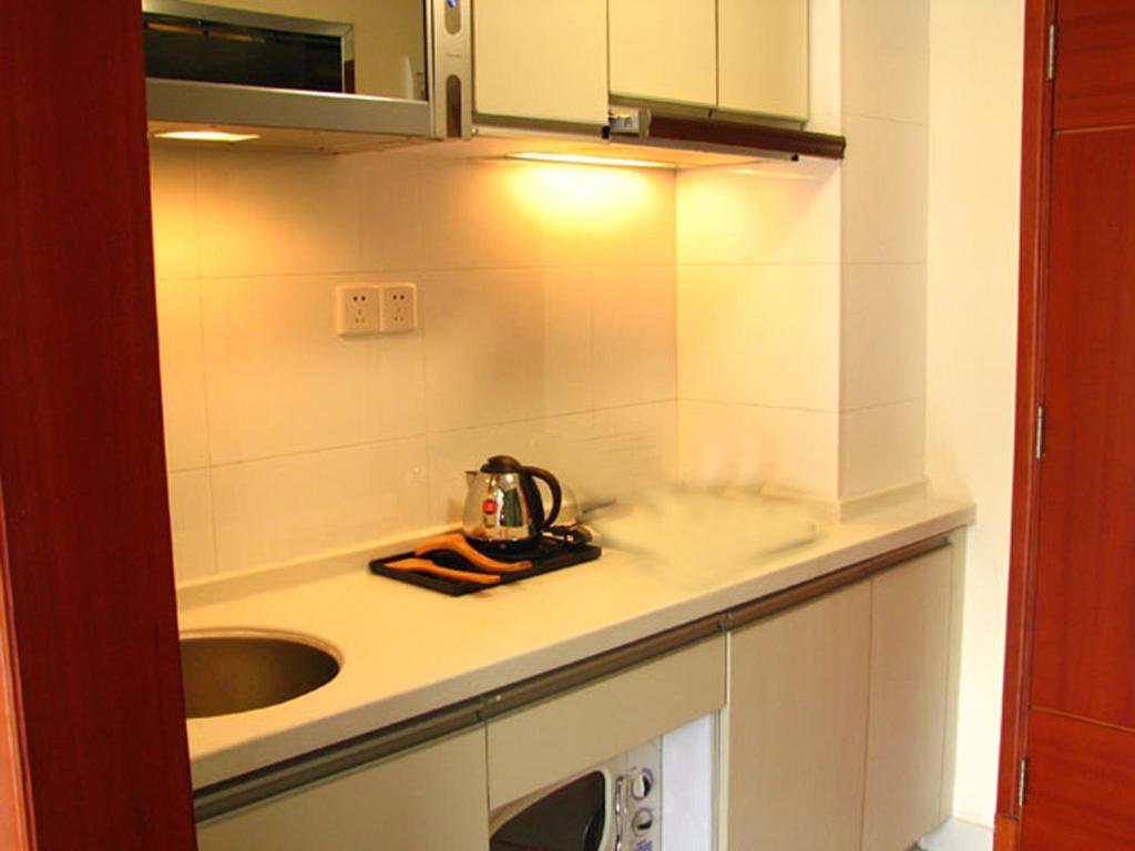 Estay Apartments Гуанчжоу Номер фото